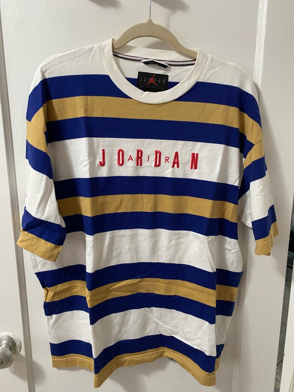 Jordan White, Blue & Gold Striped Short Sleeve Tee